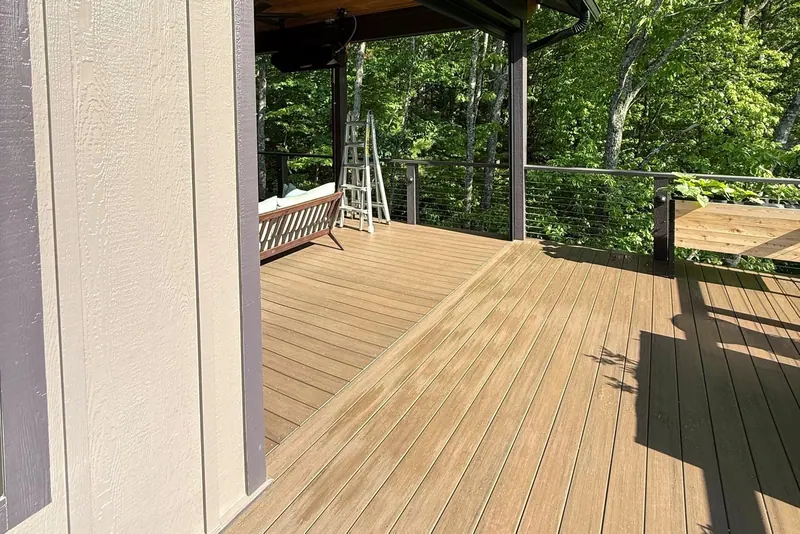 Side view of a covered deck fitted with retractable patio screens
