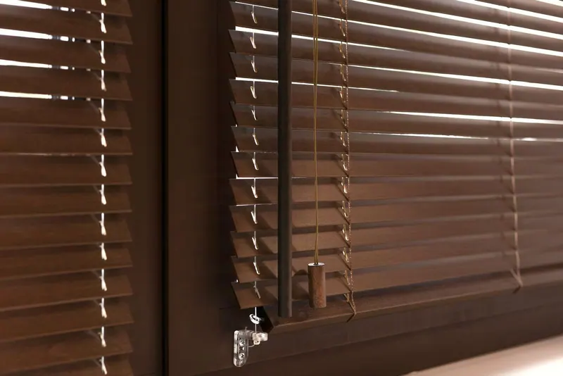 Close view of stained wood blind slats